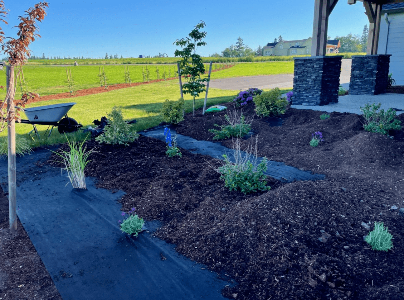 Putting down weed blocker for front garden