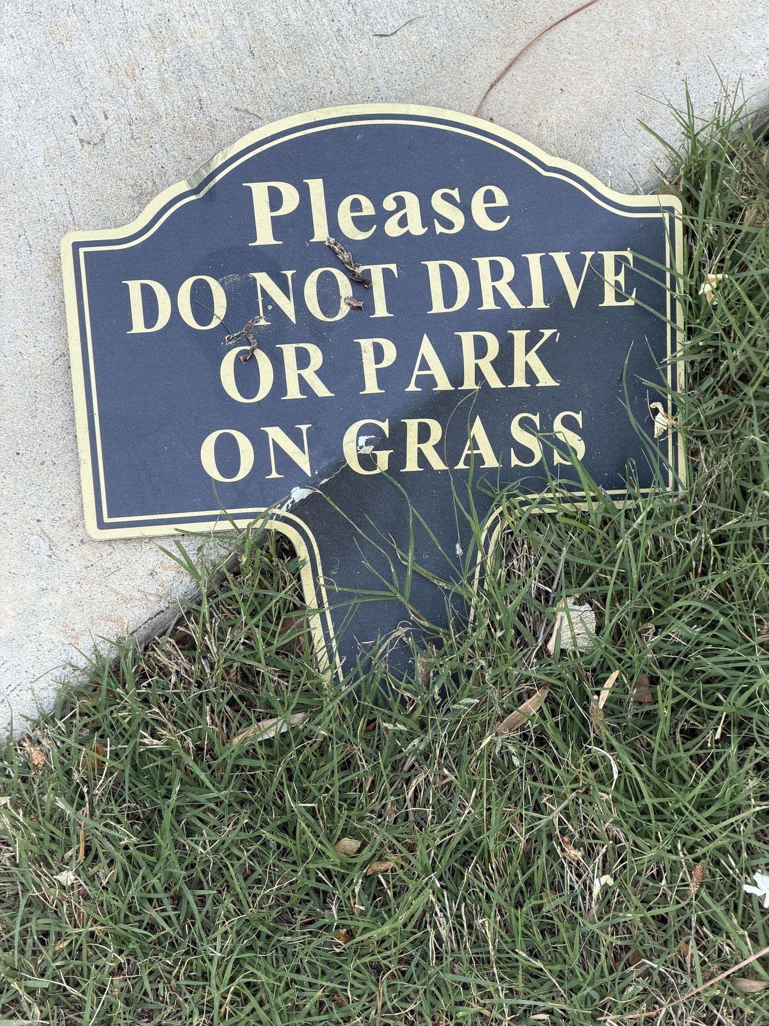 Sign with grass